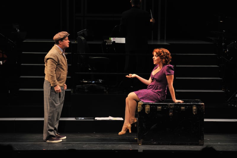 Michael McGrath (Dromio of Ephesus), L, and Leslie Kritzer (Luce) act out a scene during dress rehearsal for Rodgers and Hart's "The Boys of Syracus\" at the Shakespeare Theatre Company's Sidney Harman Hall on November 3, 2011, in Washington, DC.