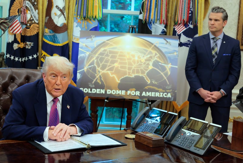 President Donald Trump speaks alongside Secretary of Defense Pete Hegseth in the Oval Office at the White House on May 20, 2025 in Washington, DC.