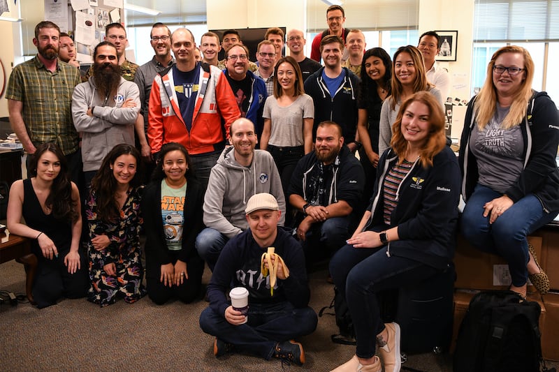 Defense Digital Service team members takes a group photo at the DSS office in the Pentagon, May 15, 2019.