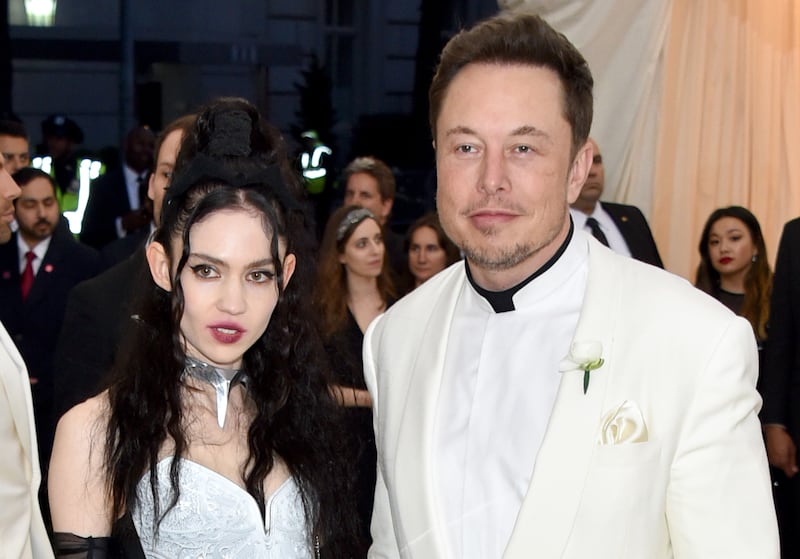 Grimes (L) and Elon Musk attend the Heavenly Bodies: Fashion & The Catholic Imagination Costume Institute Gala at The Metropolitan Museum of Art on May 7, 2018 in New York City.