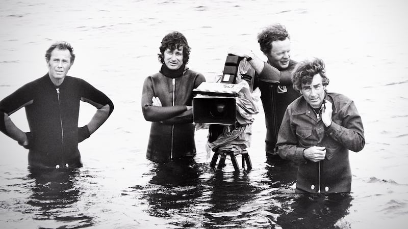 Steven Spielberg, Bill Butler, and crew on the set of Jaws in 1974.