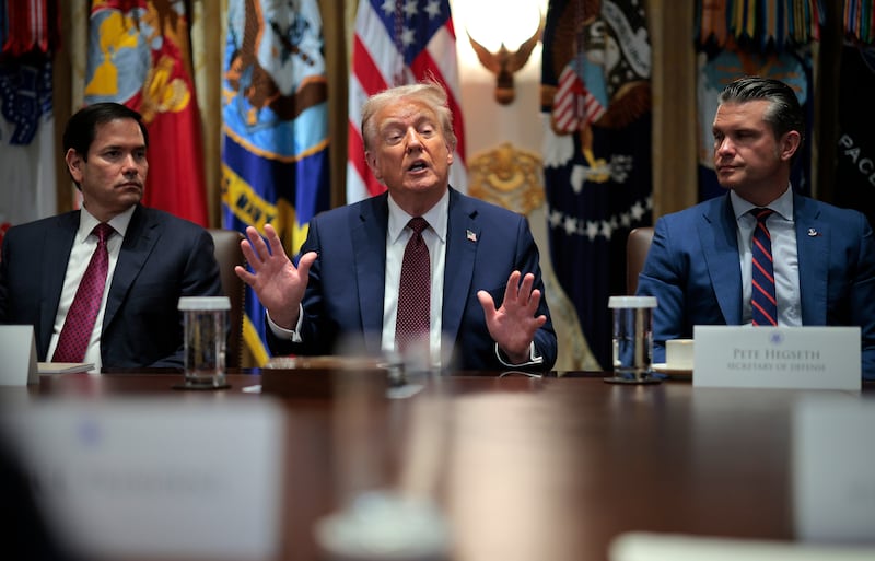 President Donald Trump flanked by Secretary of State Marco Rubio and Defense Secretary Pete Hegseth.