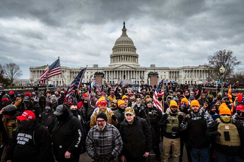 A photo including Pro-Trump protesters