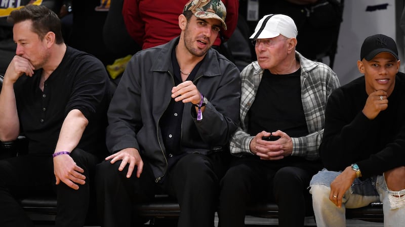 LOS ANGELES, CALIFORNIA - MAY 12: Elon Musk (2L) and David Geffen (2R) attend the Western Conference Semifinal Playoff game between the Los Angeles Lakers and Golden State Warriors at Crypto.com Arena on May 12, 2023 in Los Angeles, California. (Photo by Kevork Djansezian/Getty Images)