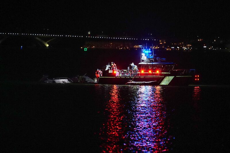 Emergency response units respond to airplane wreckage in the Potomac River near Ronald Reagan Washington Airport on January 30, 2025 in Arlington, Virginia.