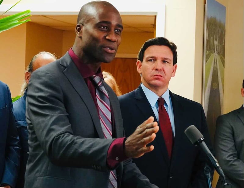 Florida Surgeon General Joseph Ladapo and Gov. Ron DeSantis at a news conference in West Palm Beach, Florida on Thursday, Jan. 6, 2022. (Joe Cavaretta/Sun Sentinel/Tribune News Service via Getty Images)
