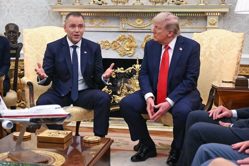 US President Donald Trump hosts Polish President Karol Nawrocki (L) in the Oval Office at the White House in Washington, DC on September 3, 2025.