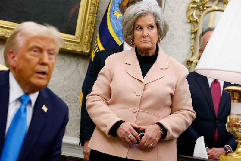 White House Chief of Staff Susie Wiles (C) looks alarmed as President Donald Trump speaks about Gaza.