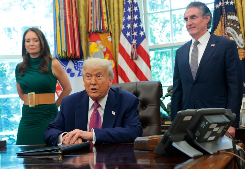 President Donald Trump, joined by Agriculture Secretary Brooke Rollins and Interior Secretary Doug Burgum, delivers a statement on natural disaster preparedness in the Oval Office at the White House on June 10, 2025