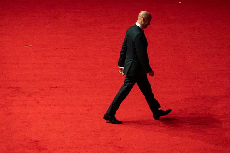 Trump adviser Stephen Miller walks off stage after speaking at Donald Trump's victory rally at the Capital One Arena on Jan. 19 in Washington, DC.