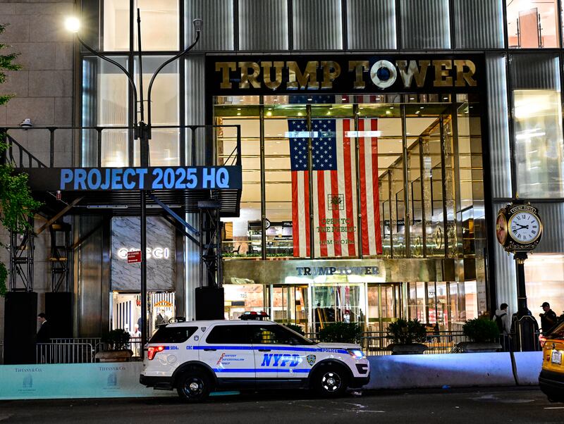 The Democratic National Committee projects messages on Trump Tower on the eve of the vice presidential debate on September 30, 2024 in New York City.