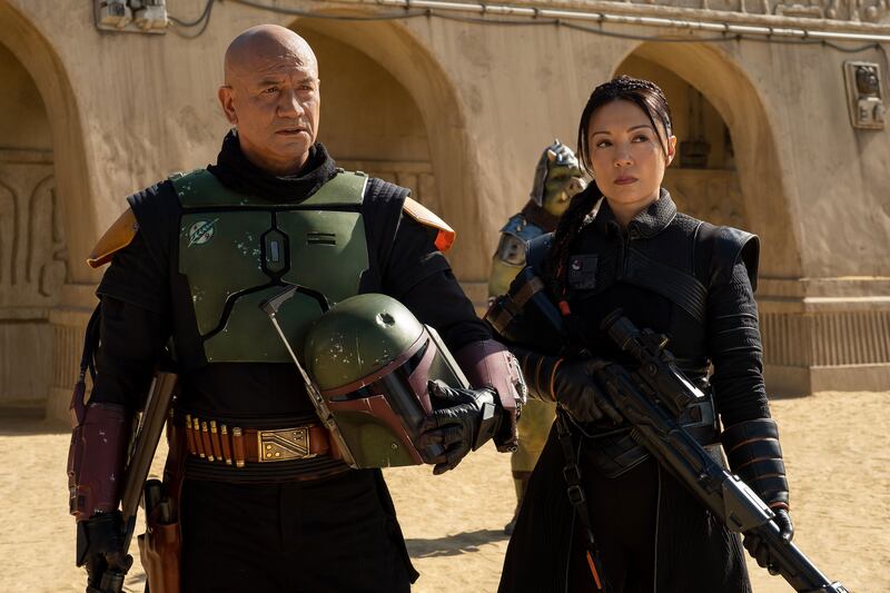 Boba Fett and Fennec Shand stand next to each other in a still from ‘The Book of Boba Fett’