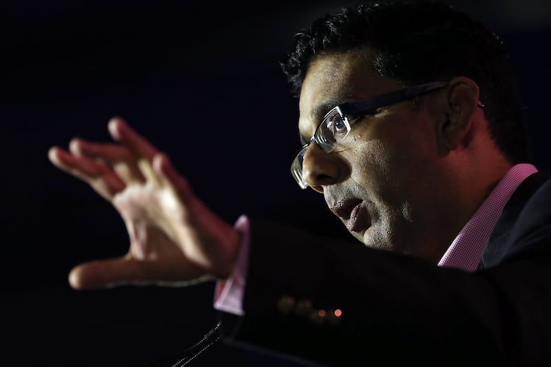 articles/2014/06/30/in-dinesh-d-souza-s-america-slavery-wasn-t-so-bad-but-hillary-and-barack-are-socialist-devils/140628-romano-dinesh-dsouza-tease_cwjqu8