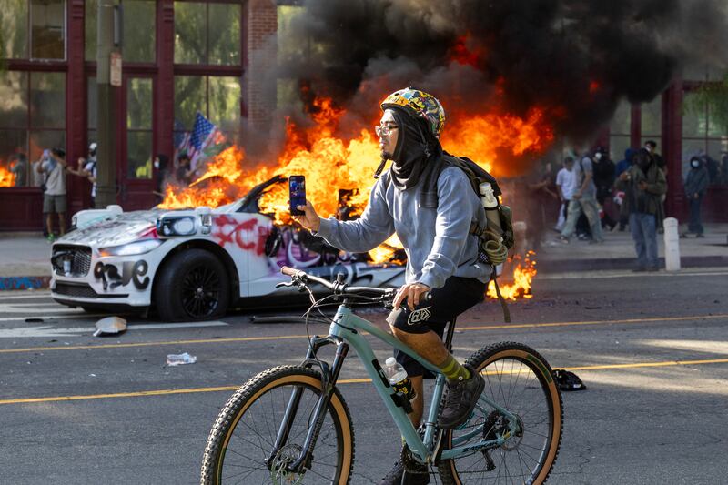 Protesters have set fire to cars and clashed with law enforcement during the unrest.