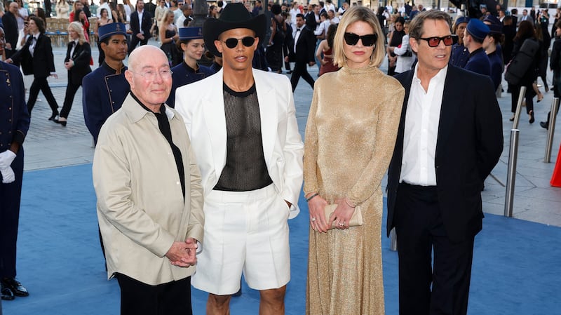 (From L) US producer David Geffen, Donovan Michaels, British model Lady Jemma Mornington and French businessman Arpad Busson poses during a photocall upon arrival to attend the Spring/Summer 2025 menswear ready to wear joint fashion show hosted by Vogue World as part of Paris Fashion Week at Place Vendome in Paris, on June 23, 2024, ahead of the upcoming Paris 2024 Olympic Games. (Photo by Geoffroy VAN DER HASSELT / AFP) (Photo by GEOFFROY VAN DER HASSELT/AFP via Getty Images)