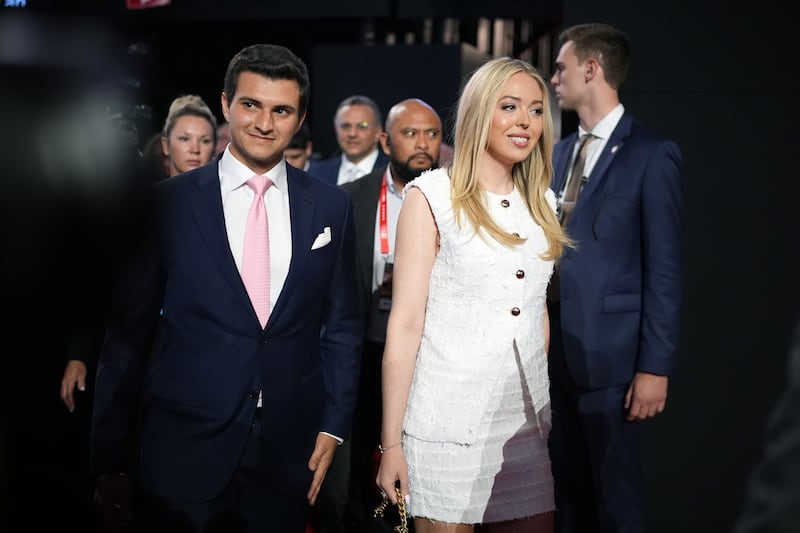 MILWAUKEE, WISCONSIN - JULY 16: Tiffany Trump, daughter of former U.S. President Donald Trump, walks with her husband Michael Boulos (L) on the second day of the Republican National Convention at the Fiserv Forum on July 16, 2024 in Milwaukee, Wisconsin. Delegates, politicians, and the Republican faithful are in Milwaukee for the annual convention, concluding with former President Donald Trump accepting his party's presidential nomination. The RNC takes place from July 15-18. (Photo by Andrew Harnik/Getty Images)