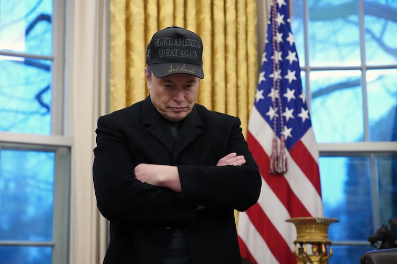 Elon Musk joins U.S. President Donald Trump during an executive order signing in the Oval Office at the White House