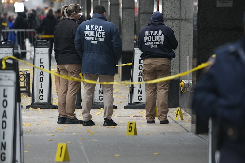 Crime Scene Unit police work at the scene where CEO of UnitedHealthcare Brian Thompson, 50, was shot as he entered the New York Hilton early on Dec. 4, 2024 in New York.