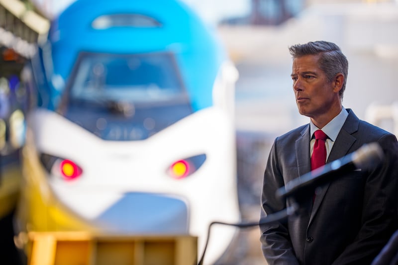 WASHINGTON, DC - AUGUST 27: U.S. Transportation Secretary Sean Duffy stands near a NextGen Amtrak Acela train during a news conference for the upgraded train's first day of service along the Northeast Corridor on August 27, 2025 in Washington, DC. Amtrak has launched its faster, upgraded NextGen Acela service along the Northeast Corridor as the Trump administration moves to take control of D.C.'s Union Station, citing a push to restore safety and revitalize the historic hub.