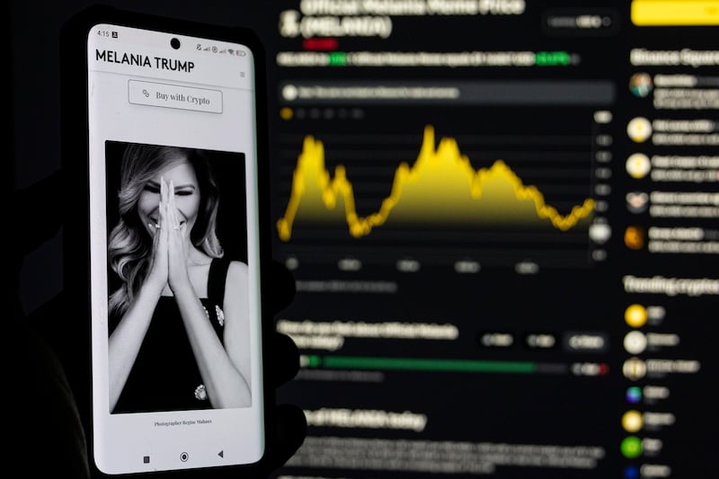 Photo illustration of Melania Meme, a memecoin launched by Melania Trump displayed on a smartphone and a computer screen with the current price charts showed from Binance cryptocurrency exchange page. January 20, 2024 in Amsterdam, the Netherlands (Photo by Nicolas Economou/NurPhoto via Getty Images)