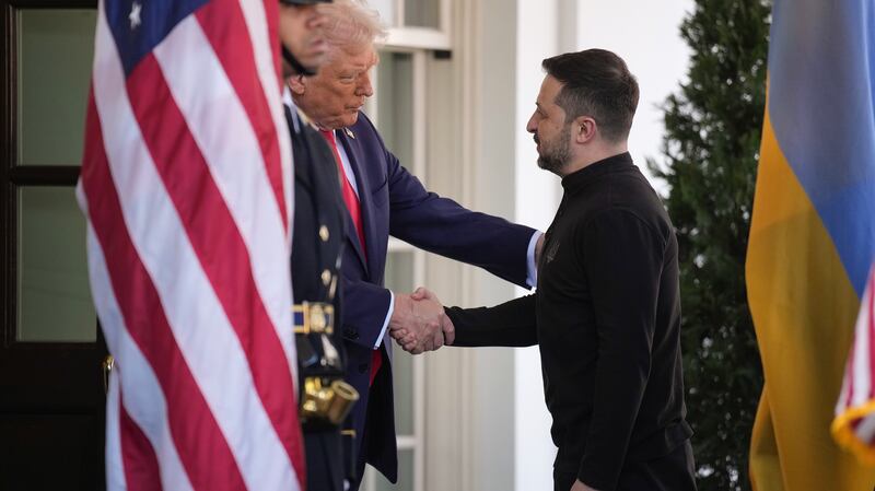 President Donald Trump greets Ukrainian president Volodymyr Zelensky as he arrives at the White House.