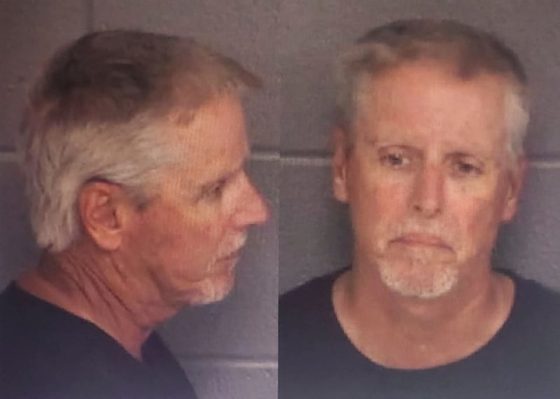 Colin Gray, 54, father of 14-year-old suspected Apalachee High School shooter Colt Gray, poses for police booking photos.