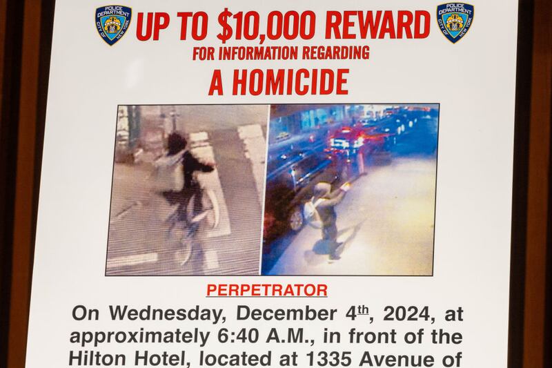 A wanted poster for the suspect believed to have killed UnitedHealthcare CEO Brian Thompson.