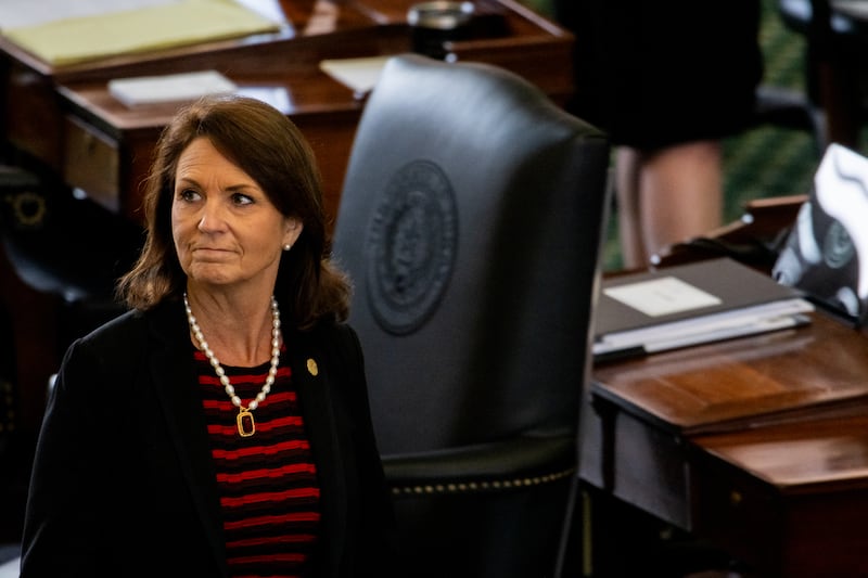 Angela Paxton was barred from voting during her husband's trial.