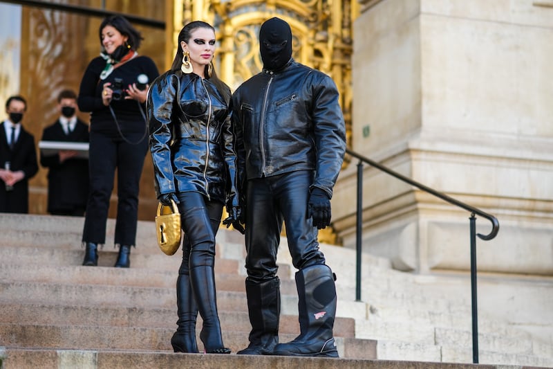 Julia Fox and Kanye West are seen posing outside the Schiaparelli Spring-Summer 2022 Haute Couture fashion show during Paris Fashion Week n January 24, 2022.