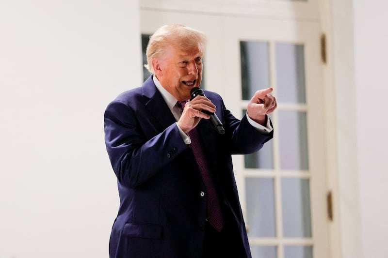Donald Trump speaks at a dinner for lawmakers on the newly renovated Rose Garden patio.