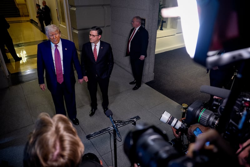 President Donald Trump and Speaker of the House Mike Johnson speak to members of the media following a House Republican meeting at the U.S. Capitol on May 20, 2025 in Washington, D.C.