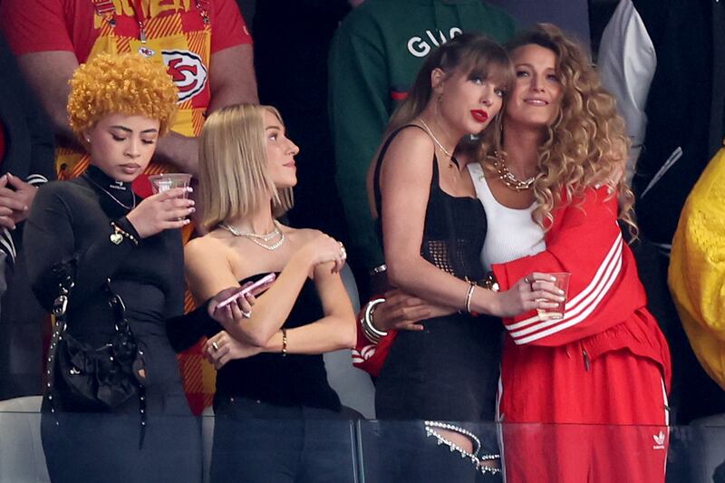 LAS VEGAS, NEVADA - FEBRUARY 11: Rapper Ice Spice, singer Taylor Swift and actress Blake Lively prior to Super Bowl LVIII between the San Francisco 49ers and Kansas City Chiefs at Allegiant Stadium on February 11, 2024 in Las Vegas, Nevada. (Photo by Steph Chambers/Getty Images)