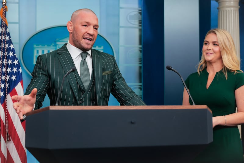 WASHINGTON, DC - MARCH 17: Former UFC champion and Irish businessman Conor McGregor briefly speaks with reporters alongside White House Press Secretary Karoline Leavitt before meeting with President Donald Trump in the Brady Press Briefing Room at the White House on Saint Patrick's Day, March 17, 2025 in Washington, DC. McGregor said he is meeting with Trump to talk about how Ireland is losing its identity to immigrants, among other topics. (Photo by Chip Somodevilla/Getty Images)