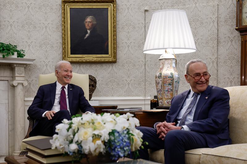 President Joe Biden meets with then-Senate Majority Leader Chuck Schumer in the Oval Office in May.