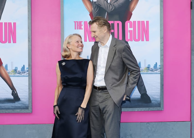 Liam Neeson shares the "strange" sex scene he filmed with Pamela Anderson in "The Naked Gun."
