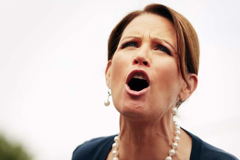 articles/2013/05/29/michele-bachmann-is-done-her-hostage-video-to-reality/bachmann-yells-out-tease_q5ykzx