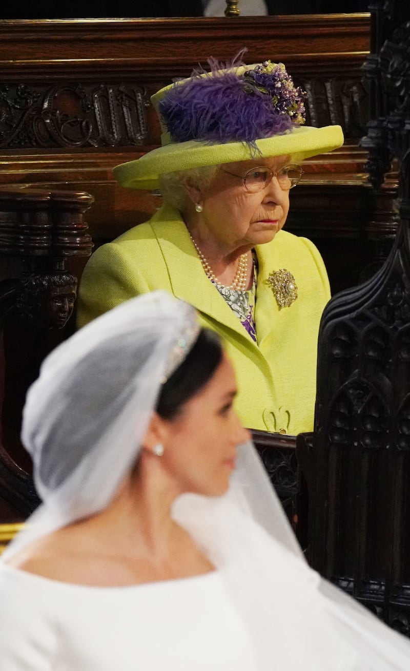 WINDSOR, UNITED KINGDOM - MAY 19: Queen Elizabeth II looks on during the wedding of Prince Harry to Meghan Markle on May 19, 2018 in Windsor, England. (Photo by Jonathan Brady - WPA Pool/Getty Images)