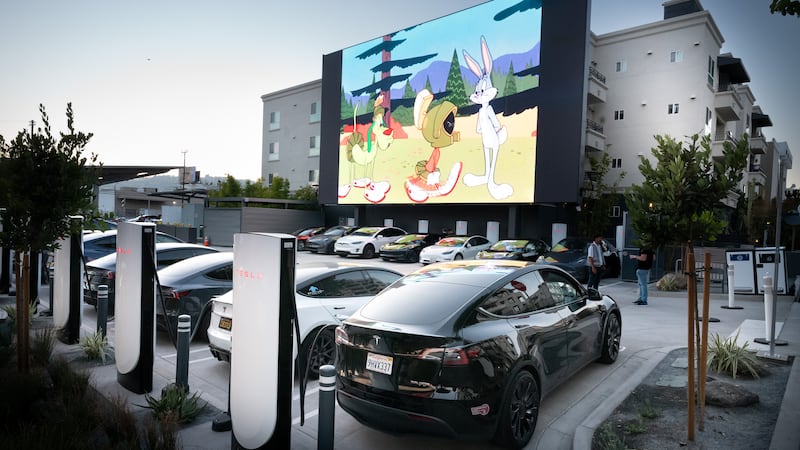 Multiple apartments are entirely obscured by the diner's 45-foot-long movie screens.