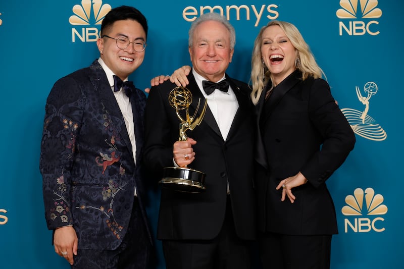 LOS ANGELES, CALIFORNIA - SEPTEMBER 12: Lorne Michaels (C), winner of Outstanding Variety Sketch Series for "Saturday Night Live," poses in the press room with Bowen Yang (L) and Kate McKinnon (R) during the 74th Primetime Emmys at Microsoft Theater on September 12, 2022 in Los Angeles, California. (Photo by Frazer Harrison/Getty Images)