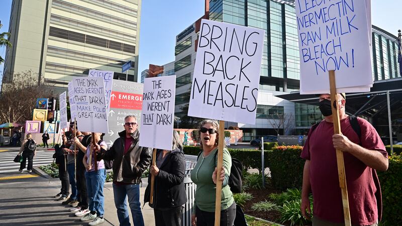 Demostrators protest against US President-elect Donald Trump's nomination of Robert F. Kennedy Jr. to head the Department of Health and Human Services, outside of Children's Hospital Los Angeles in Los Angeles, California on December 23, 2024. (Photo by Frederic J. BROWN / AFP) (Photo by FREDERIC J. BROWN/AFP via Getty Images)