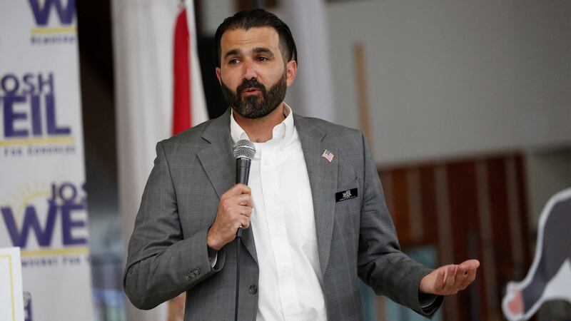 Josh Weil, a schoolteacher and Democratic candidate for Florida's 6th Congressional District seat in the U.S. House of Representatives, speaks at a town hall event in Ocala, Florida, March 26, 2025.