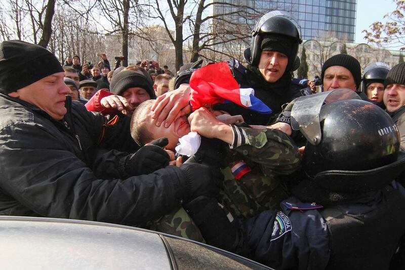 articles/2014/03/20/soccer-hooligans-prep-ukraine-for-putin/140319-dettmer-donetsk2-embed_isvzrf