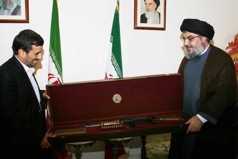 articles/2012/07/18/did-hezbollah-do-it/Iran-Hezb-openz_s3n3nv