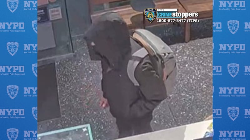 A masked man wearing a black jacket.