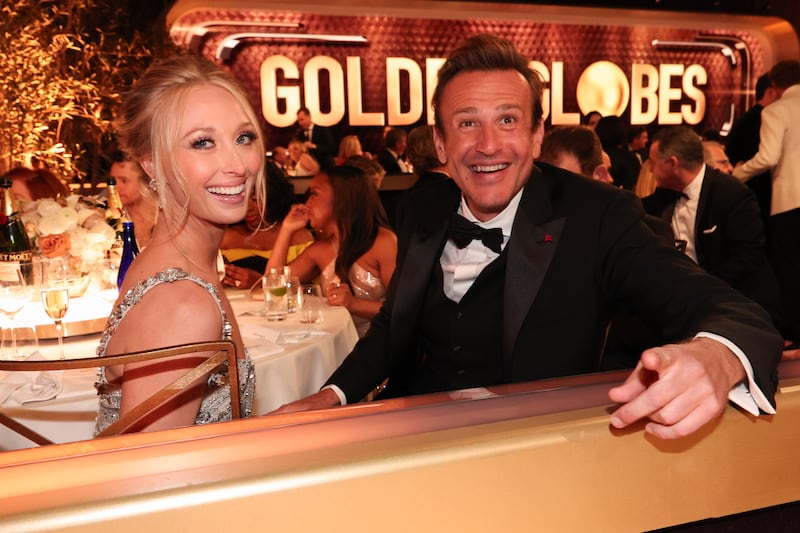 Kayla Radomski and Jason Segel at the 2024 Golden Globe Awards.