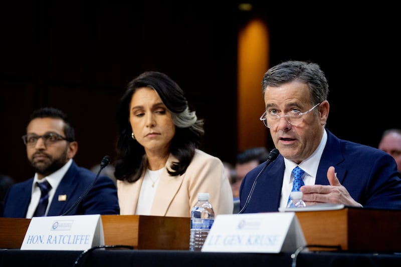 Central Intelligence Agency Director John Ratcliffe, accompanied by FBI Director Kash Patel, and Director of National Intelligence Tulsi Gabbard, speaks during a Senate Committee on Intelligence Hearing on March 25, 2025 in Washington, D.C.