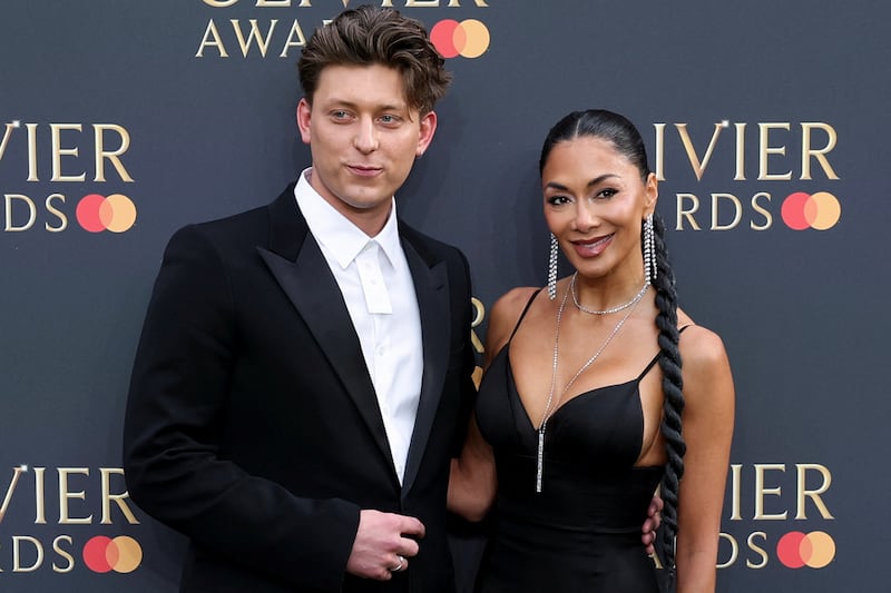 Nicole Scherzinger and Tom Francis attend the Olivier Awards at the Royal Albert Hall in London, Britain, April 14, 2024.