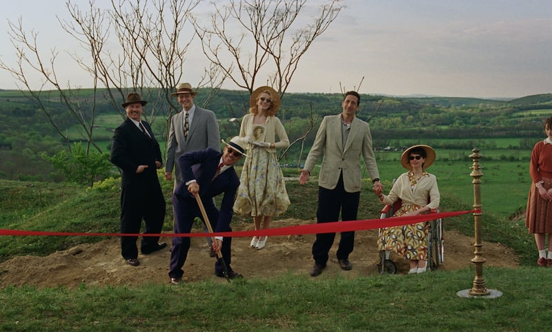 (L-R) Joe Alwyn, Guy Pearce, Stacy Martin, Adrien Brody, Felicity Jones, and Raffey Cassidy.