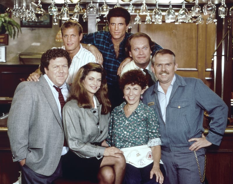 “Cheers” cast members pose for a portrait in October 1983 in Los Angeles, California.