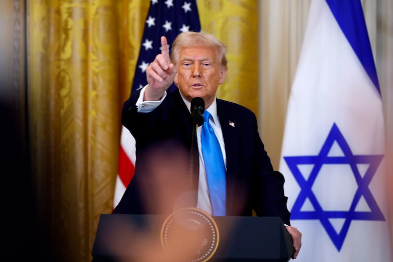 President Donald Trump calls on reporters during a joint news conference with Israeli Prime Minister Benjamin Netanyahu in the East Room of the White House on February 04, 2025 in Washington, DC.